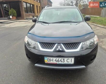 Черный Мицубиси Аутлендер ХЛ, объемом двигателя 2.36 л и пробегом 87 тыс. км за 11500 $, фото 1 на Automoto.ua