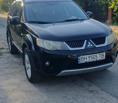 Чорний Міцубісі Аутлендер ХЛ, об'ємом двигуна 2.4 л та пробігом 325 тис. км за 7000 $, фото 1 на Automoto.ua