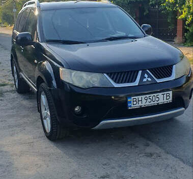 Чорний Міцубісі Аутлендер ХЛ, об'ємом двигуна 2.4 л та пробігом 325 тис. км за 7000 $, фото 1 на Automoto.ua