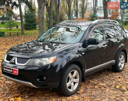 Черный Мицубиси Аутлендер ХЛ, объемом двигателя 3 л и пробегом 285 тыс. км за 9590 $, фото 1 на Automoto.ua