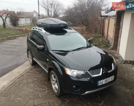 Черный Мицубиси Аутлендер ХЛ, объемом двигателя 2.36 л и пробегом 41 тыс. км за 12000 $, фото 1 на Automoto.ua