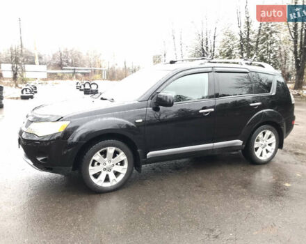 Чорний Міцубісі Аутлендер ХЛ, об'ємом двигуна 2 л та пробігом 306 тис. км за 9799 $, фото 1 на Automoto.ua