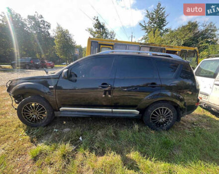 Чорний Міцубісі Аутлендер ХЛ, об'ємом двигуна 2 л та пробігом 200 тис. км за 2450 $, фото 1 на Automoto.ua