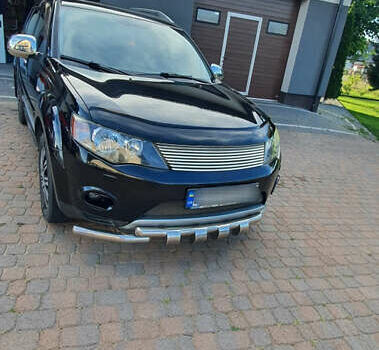 Мицубиси Аутлендер ХЛ 2009 в Тернополе на Automoto.ua Черный Мицубиси Аутлендер ХЛ, объемом двигателя 2.4 л и пробегом 146 тыс. км за 10500 $, фото 1 на Automoto.ua