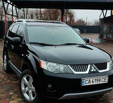 Чорний Міцубісі Аутлендер ХЛ, об'ємом двигуна 2.36 л та пробігом 150 тис. км за 11100 $, фото 1 на Automoto.ua