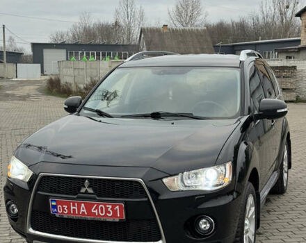 Черный Мицубиси Аутлендер ХЛ, объемом двигателя 2 л и пробегом 266 тыс. км за 10850 $, фото 1 на Automoto.ua