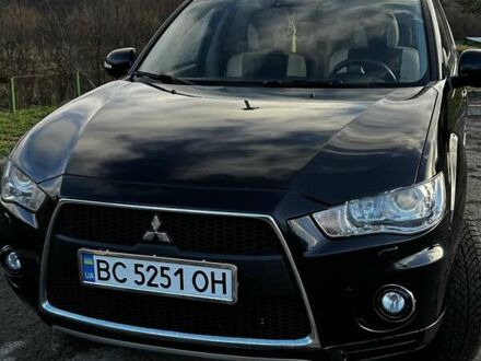 Черный Мицубиси Аутлендер ХЛ, объемом двигателя 2.2 л и пробегом 249 тыс. км за 11500 $, фото 1 на Automoto.ua