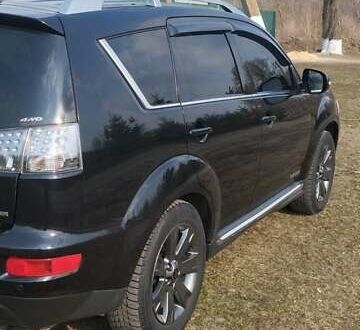 Мицубиси Аутлендер ХЛ 2010 в Путивле на Automoto.ua Черный Мицубиси Аутлендер ХЛ, объемом двигателя 2 л и пробегом 209 тыс. км за 12000 $, фото 1 на Automoto.ua