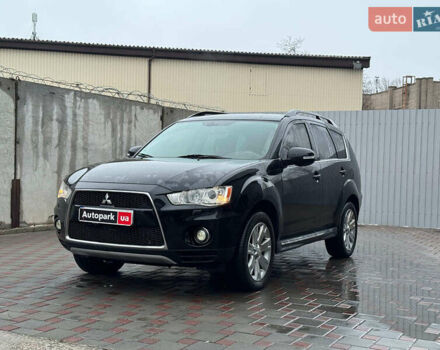 Черный Мицубиси Аутлендер ХЛ, объемом двигателя 2.18 л и пробегом 253 тыс. км за 12490 $, фото 1 на Automoto.ua