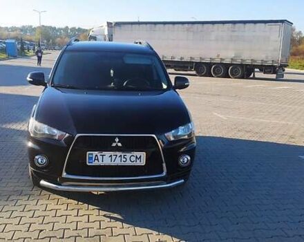 Черный Мицубиси Аутлендер ХЛ, объемом двигателя 2.2 л и пробегом 230 тыс. км за 12300 $, фото 1 на Automoto.ua