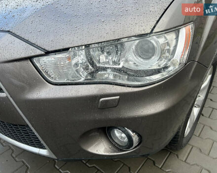 Коричневый Мицубиси Аутлендер ХЛ, объемом двигателя 2.2 л и пробегом 259 тыс. км за 12300 $, фото 2 на Automoto.ua