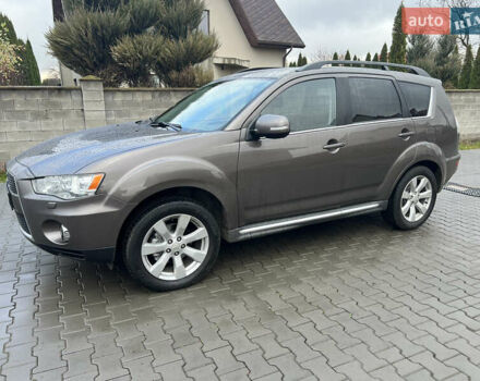 Коричневый Мицубиси Аутлендер ХЛ, объемом двигателя 2.2 л и пробегом 259 тыс. км за 12300 $, фото 1 на Automoto.ua
