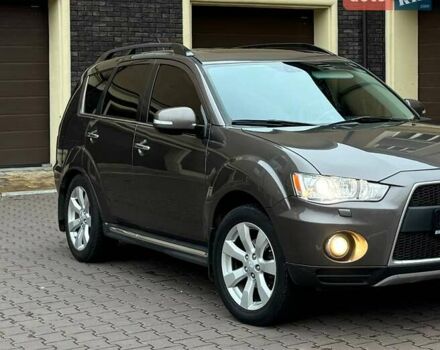 Коричневий Міцубісі Аутлендер ХЛ, об'ємом двигуна 2.36 л та пробігом 160 тис. км за 10900 $, фото 2 на Automoto.ua
