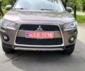 Коричневый Мицубиси Аутлендер ХЛ, объемом двигателя 2 л и пробегом 200 тыс. км за 11800 $, фото 1 на Automoto.ua