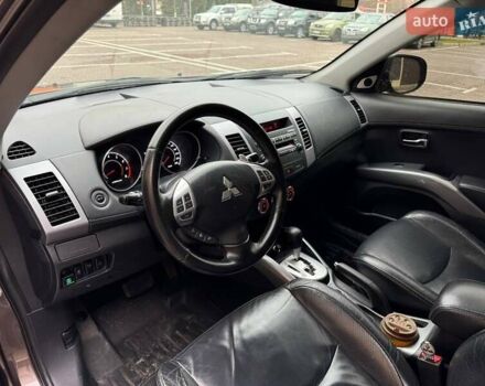 Коричневий Міцубісі Аутлендер ХЛ, об'ємом двигуна 2.36 л та пробігом 160 тис. км за 10900 $, фото 5 на Automoto.ua