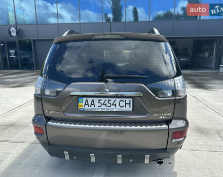 Коричневий Міцубісі Аутлендер ХЛ, об'ємом двигуна 2.4 л та пробігом 349 тис. км за 10300 $, фото 13 на Automoto.ua