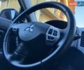Коричневий Міцубісі Аутлендер ХЛ, об'ємом двигуна 2 л та пробігом 219 тис. км за 10750 $, фото 156 на Automoto.ua