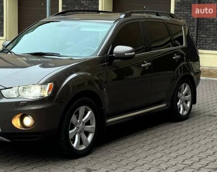 Коричневий Міцубісі Аутлендер ХЛ, об'ємом двигуна 2.36 л та пробігом 160 тис. км за 10900 $, фото 1 на Automoto.ua