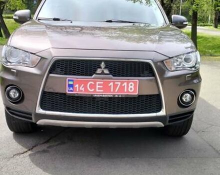 Коричневий Міцубісі Аутлендер ХЛ, об'ємом двигуна 2 л та пробігом 200 тис. км за 11800 $, фото 1 на Automoto.ua