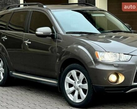 Коричневий Міцубісі Аутлендер ХЛ, об'ємом двигуна 2.36 л та пробігом 160 тис. км за 10900 $, фото 1 на Automoto.ua