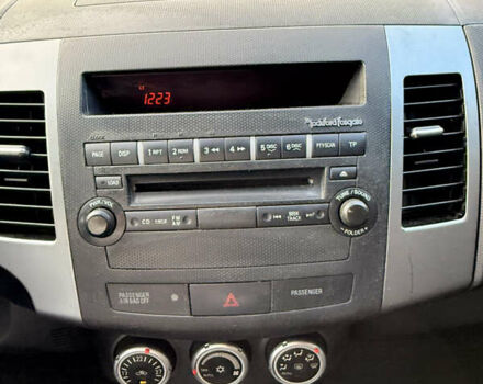 Мицубиси Аутлендер ХЛ 2008 в Киеве на Automoto.ua Красный Мицубиси Аутлендер ХЛ, объемом двигателя 2.4 л и пробегом 99 тыс. км за 11000 $, фото 11 на Automoto.ua