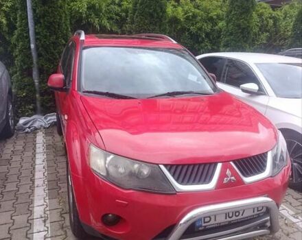 Красный Мицубиси Аутлендер ХЛ, объемом двигателя 2.4 л и пробегом 306 тыс. км за 10000 $, фото 4 на Automoto.ua