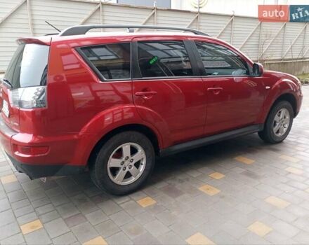 Красный Мицубиси Аутлендер ХЛ, объемом двигателя 2.4 л и пробегом 302 тыс. км за 8900 $, фото 4 на Automoto.ua