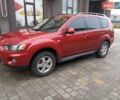 Красный Мицубиси Аутлендер ХЛ, объемом двигателя 2.4 л и пробегом 302 тыс. км за 8900 $, фото 2 на Automoto.ua