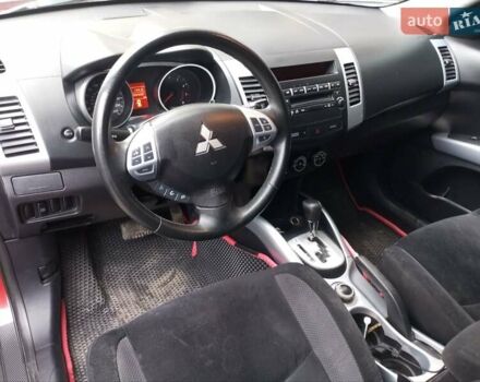 Красный Мицубиси Аутлендер ХЛ, объемом двигателя 2.4 л и пробегом 302 тыс. км за 8900 $, фото 10 на Automoto.ua
