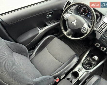Красный Мицубиси Аутлендер ХЛ, объемом двигателя 2.2 л и пробегом 188 тыс. км за 10550 $, фото 12 на Automoto.ua