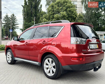 Красный Мицубиси Аутлендер ХЛ, объемом двигателя 2.2 л и пробегом 188 тыс. км за 10550 $, фото 4 на Automoto.ua