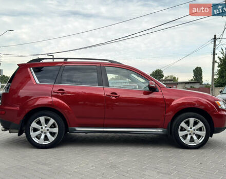 Красный Мицубиси Аутлендер ХЛ, объемом двигателя 2.2 л и пробегом 188 тыс. км за 10550 $, фото 2 на Automoto.ua