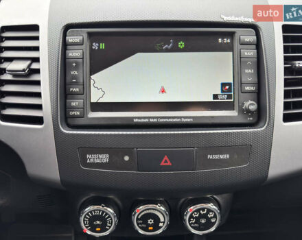 Красный Мицубиси Аутлендер ХЛ, объемом двигателя 2.2 л и пробегом 188 тыс. км за 10550 $, фото 23 на Automoto.ua