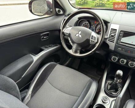 Красный Мицубиси Аутлендер ХЛ, объемом двигателя 2.2 л и пробегом 188 тыс. км за 10550 $, фото 19 на Automoto.ua