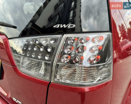 Красный Мицубиси Аутлендер ХЛ, объемом двигателя 2.2 л и пробегом 188 тыс. км за 10550 $, фото 26 на Automoto.ua