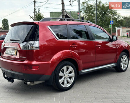 Красный Мицубиси Аутлендер ХЛ, объемом двигателя 2.2 л и пробегом 188 тыс. км за 10550 $, фото 3 на Automoto.ua