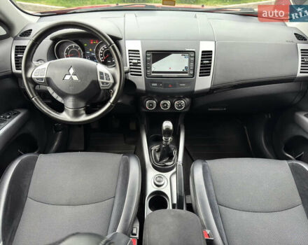 Красный Мицубиси Аутлендер ХЛ, объемом двигателя 2.2 л и пробегом 188 тыс. км за 10550 $, фото 18 на Automoto.ua