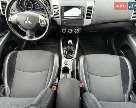 Красный Мицубиси Аутлендер ХЛ, объемом двигателя 2.2 л и пробегом 188 тыс. км за 10550 $, фото 11 на Automoto.ua