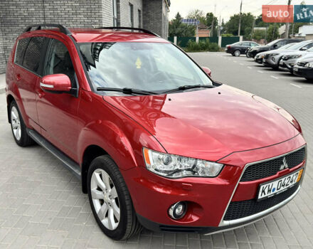 Красный Мицубиси Аутлендер ХЛ, объемом двигателя 2.2 л и пробегом 188 тыс. км за 10550 $, фото 5 на Automoto.ua