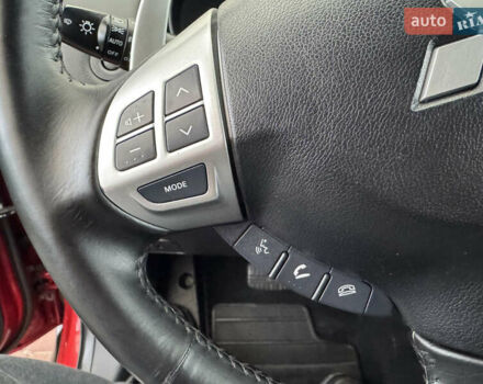 Красный Мицубиси Аутлендер ХЛ, объемом двигателя 2.2 л и пробегом 227 тыс. км за 11999 $, фото 24 на Automoto.ua