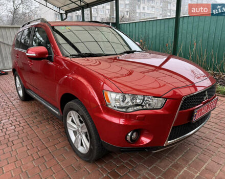 Красный Мицубиси Аутлендер ХЛ, объемом двигателя 2.2 л и пробегом 227 тыс. км за 11999 $, фото 7 на Automoto.ua