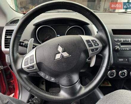 Красный Мицубиси Аутлендер ХЛ, объемом двигателя 2.2 л и пробегом 227 тыс. км за 11999 $, фото 22 на Automoto.ua