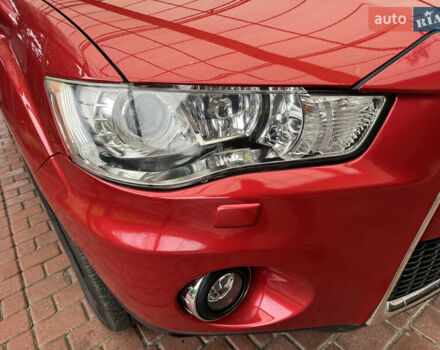 Красный Мицубиси Аутлендер ХЛ, объемом двигателя 2.2 л и пробегом 227 тыс. км за 11999 $, фото 11 на Automoto.ua