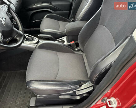 Красный Мицубиси Аутлендер ХЛ, объемом двигателя 2.2 л и пробегом 227 тыс. км за 11999 $, фото 18 на Automoto.ua