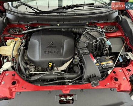 Красный Мицубиси Аутлендер ХЛ, объемом двигателя 2.2 л и пробегом 227 тыс. км за 11999 $, фото 56 на Automoto.ua