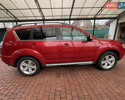 Красный Мицубиси Аутлендер ХЛ, объемом двигателя 2.2 л и пробегом 227 тыс. км за 11999 $, фото 6 на Automoto.ua