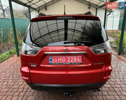 Красный Мицубиси Аутлендер ХЛ, объемом двигателя 2.2 л и пробегом 227 тыс. км за 11999 $, фото 4 на Automoto.ua