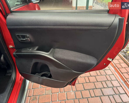 Красный Мицубиси Аутлендер ХЛ, объемом двигателя 2.2 л и пробегом 227 тыс. км за 11999 $, фото 47 на Automoto.ua