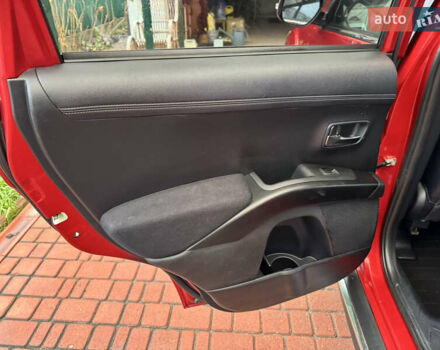 Красный Мицубиси Аутлендер ХЛ, объемом двигателя 2.2 л и пробегом 227 тыс. км за 11999 $, фото 39 на Automoto.ua