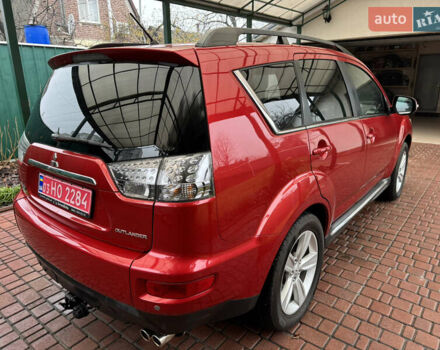Красный Мицубиси Аутлендер ХЛ, объемом двигателя 2.2 л и пробегом 227 тыс. км за 11999 $, фото 5 на Automoto.ua